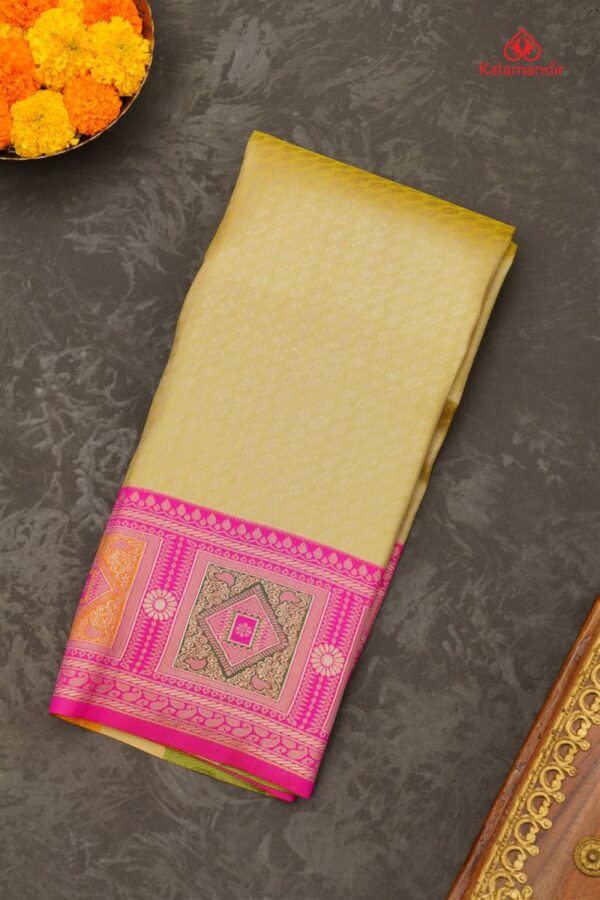 Latest YELLOW ABSTRACT TISSUE SILK Saree with CONTRAST ZARI border. This saree comes with BROCADE SILK blouse.